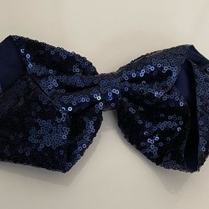 NWOT- Never been worn.  Navy blue sequin bow